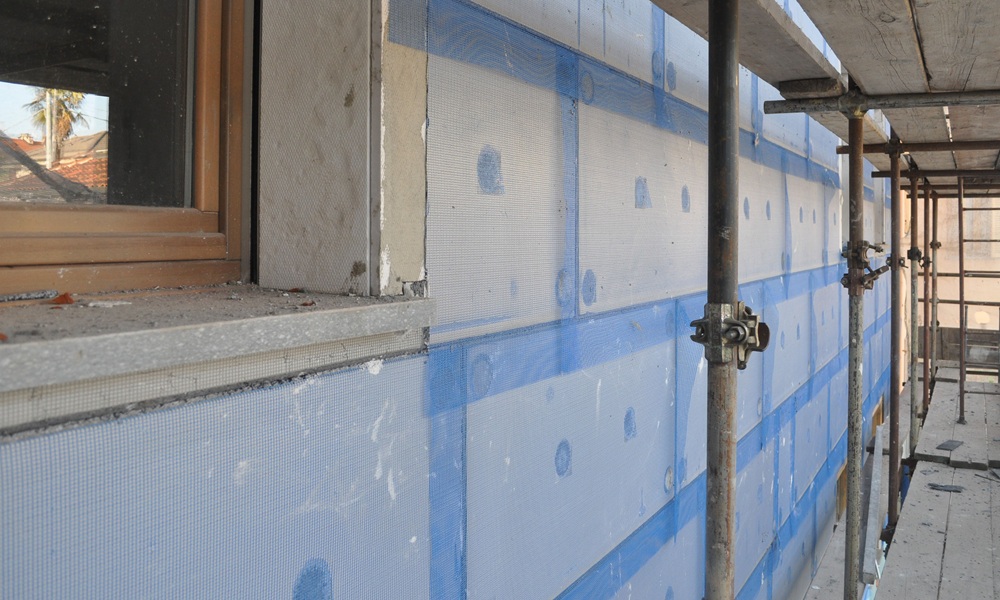External wall insulation being applied to a house in the UK